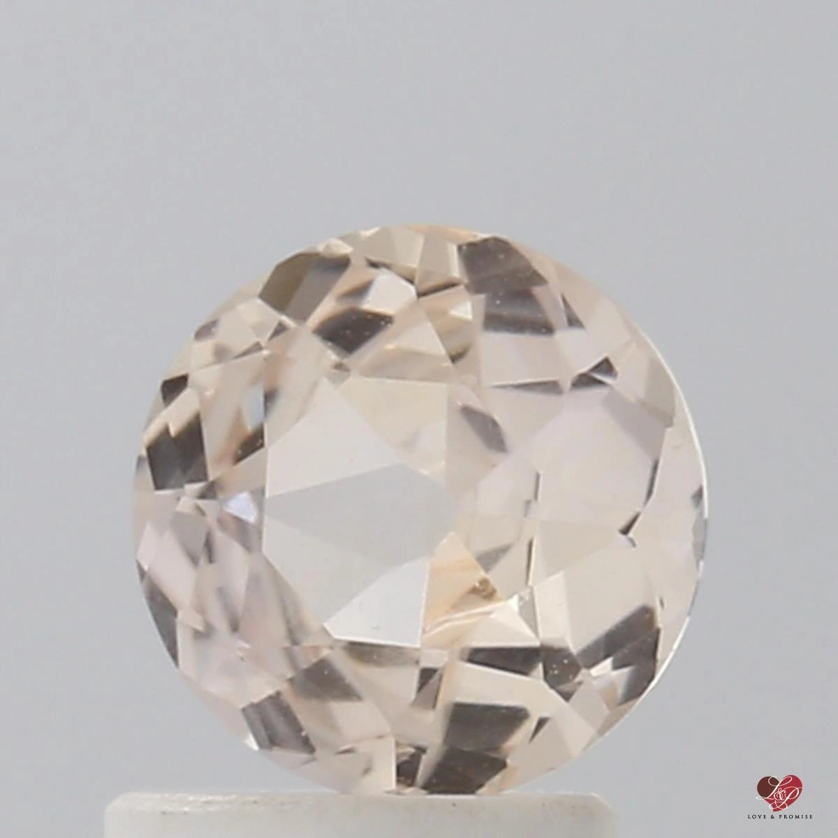 1.28cts Round Peach Blush Champagne Sapphire