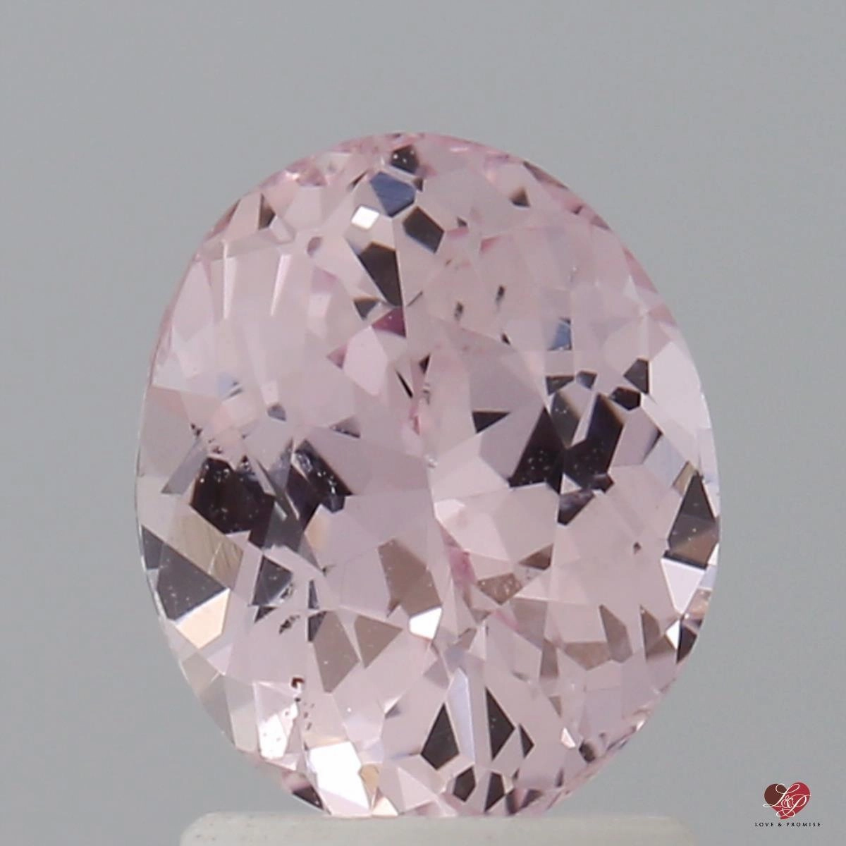 1.93cts Oval Medium Peach Blush Champagne Sapphire