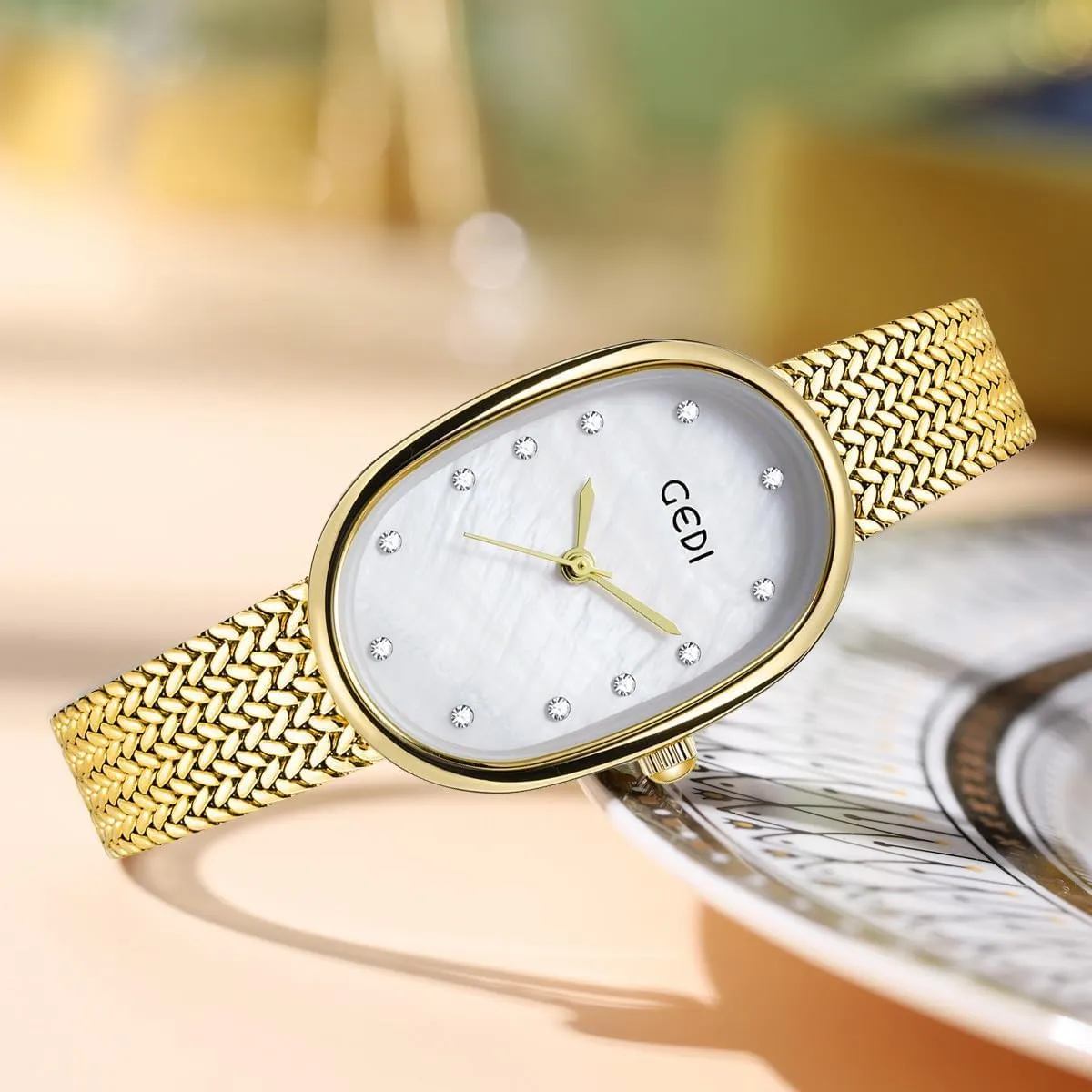 Gosasa Elegant Women's Quartz Watch - Oval Dial, Slim & Cute, Modern Minimalist Design, 30m Waterproof, Mother-of-Pearl Face, Adjustable Stainless Steel Mesh Band