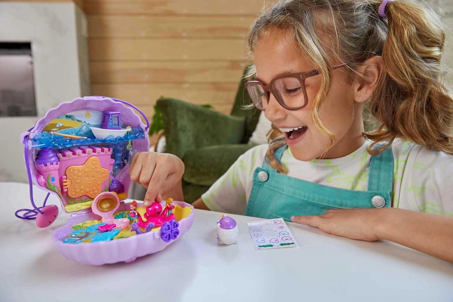 Polly Pocket Tiny Power Seashell Purse Compact with Wearable Strap, Fun Under-The-Sea Features, Micro Polly and Lila Mermaid Dolls, 2 Accessories & Sticker Sheet; for Ages 4 Years Old & Up